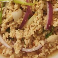 Larb Gai · Ground chicken breast tossed with lime chili pepper vinaigrette, thai basil, onion and cilan...