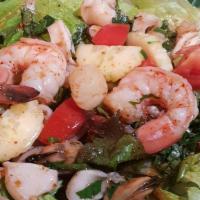 Yum Zab Seafood · Tossed  shrimp, scallops,  mussels  and 
squid  with lime chili pepper vinaigrette, thai bas...