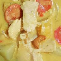 Yellow Curry · Yellow curry paste and coconut milk with pineapple, carrots, white onions, potato and cashew...