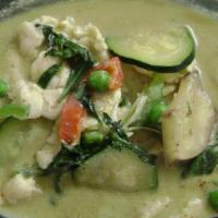 Green Curry · Green curry paste and coconut milk with zucchini, eggplants, basil, peas and bell peppers.