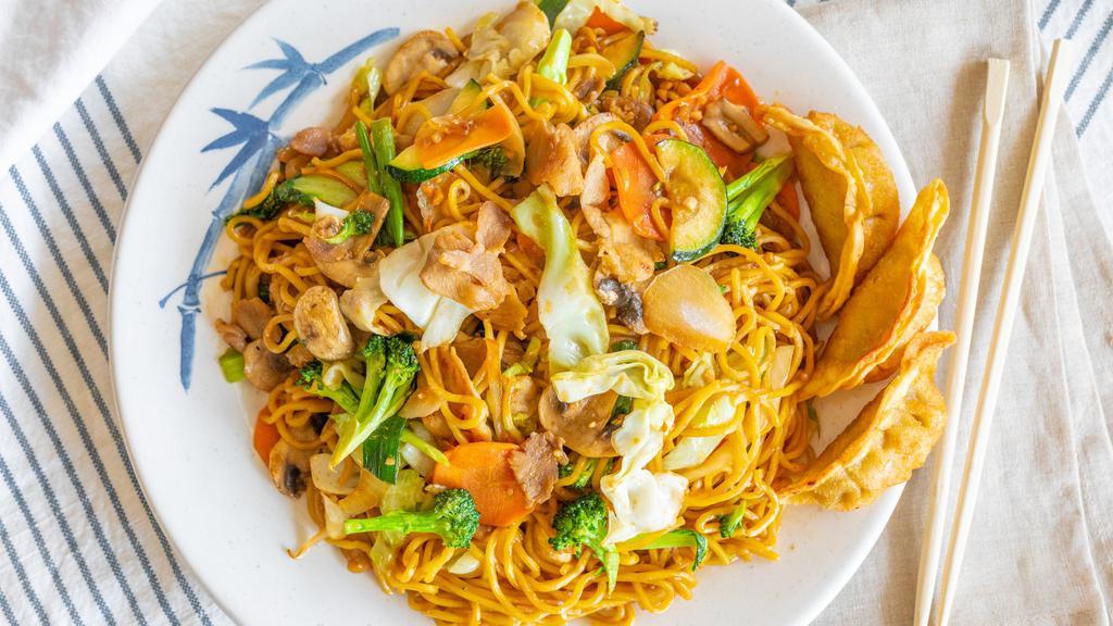 Chicken Yakisoba · This Chicken Yakisoba will satisfy all your Asian food cravings! It includes a heaping portion of chicken, cabbage, green onion, white onion, bok choy, carrot, broccoli, and zucchini!