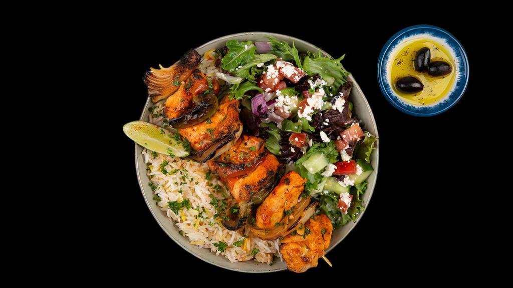 Chicken Kabob Plate · Chargrilled Cubes of Chicken Served w/ Basmati Rice, Side Salad, Fresh Pita & Your Choice of Sauce.