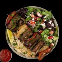 Beef Kabob Plate · Chargrilled Cubes of Beef Served w/ Basmati Rice, Side Salad, Fresh Pita & Your Choice of Sa...