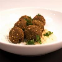 4 Falafel · Traditional Deep Fried Falafel. Made From Ground Chickpeas, Herbs, & Spices.