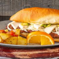 Torta · Choice of Milanesa (breaded flank) or (breaded chicken breast), grilled onions, mayo, avocad...