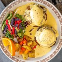 Eggs Benedict · 2 Toasted English muffin, poached eggs. Garnished with home made Hollandaise sauce. Choice o...