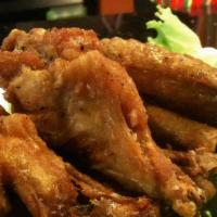 Crispy Wings (8) · seasoned and lightly breaded golden brown fried