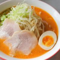 Miso Ramen · Housemade noodles in rich miso, chicken, pork, and bonito broth, topped with chashu pork, le...