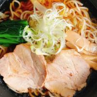Shoyu Ramen · Housemade noodles in soy sauce base rich chicken, vegetable, squid, and shellfish broth, top...