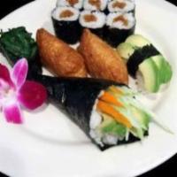Vegetarian Sushi Set · Kanpyo roll, two inari, one spinach, one avocado nigiri and vegetable hand roll.
