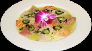 Rainbow Carpaccio · Thin sliced tuna, salmon, yellowtail and jalapeño sauce with tobiko.

Consuming raw or under...