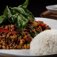 Volcano Basil (Super Spicy Basil) 🌶️🌶️ · Choice of meat stir-fried in garlic chili mix of bell peppers and Thai basil. Topped with cr...