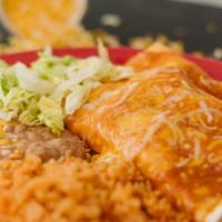 Special Burrito · A large Beef, Chicken or Chile Verde Burrito smothered with enchilada sauce and cheese. Serv...