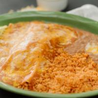 Dinner Special · A Beef, Chicken or Chile Verde burrito
smothered with enchilada sauce and melted
cheese. Ser...