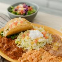 Mexican Dinner (3 Items) · House salad, served with any three of the
following: cheese enchilada, beef taco, bean tosta...