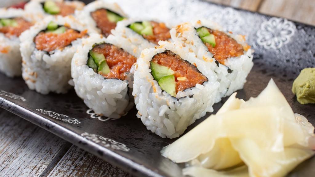 Philly Roll · Freshly smoked salmon, cream cheese, and cucumber wrapped in sushi rice and seaweed. Served with soy sauce, ginger and wasabi on the side.