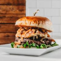 #5 Mormon Burger · Funeral potatoes, bacon, pepperjack, Jack'd sauce, grilled onion