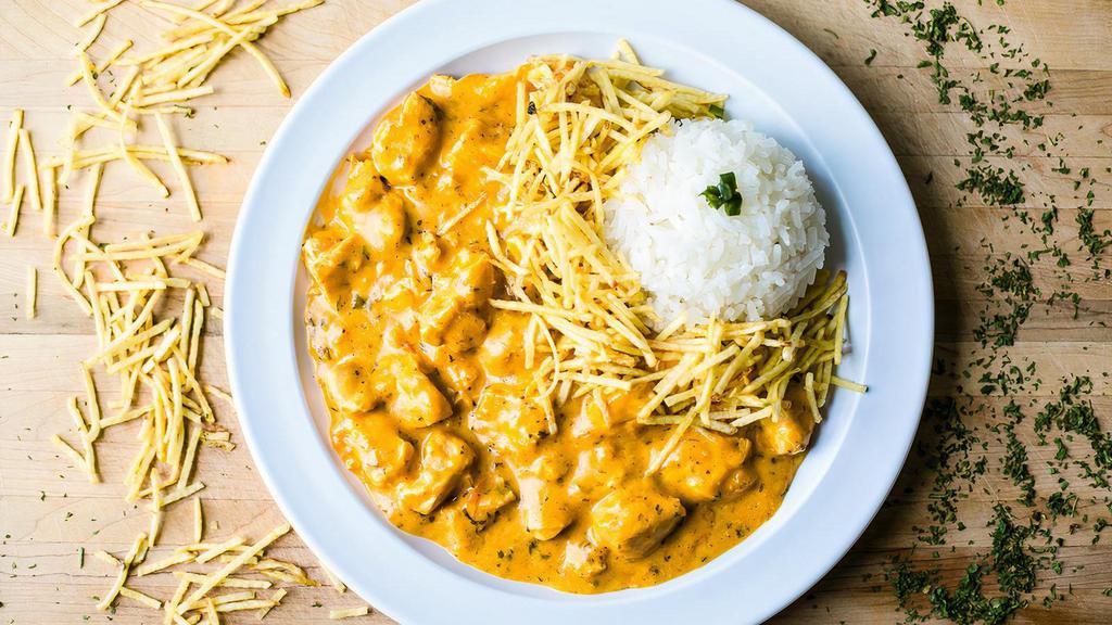 Chicken Stroganoff (Gf) · Served with rice and chips