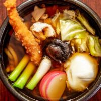 Nabeyaki Udon · Shrimp tempura, chicken, fish cake, shiitake mushroom, napa cabbage, green onions & egg; ser...