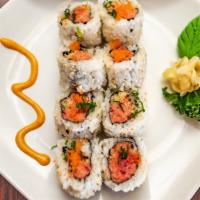Crunchy Spicy Tuna Roll · Spicy tuna, green onions, cucumber and avocado inside; topped with tempura crunch, spicy may...