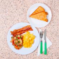 Two Egg Platter With Meat · Two scrambled eggs with two slices of buttered toast, and your choice of meat and breakfast ...