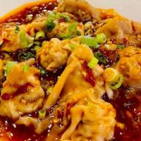 Steamed Wonton With Hot & Spicy Sauce · Hot & spicy.