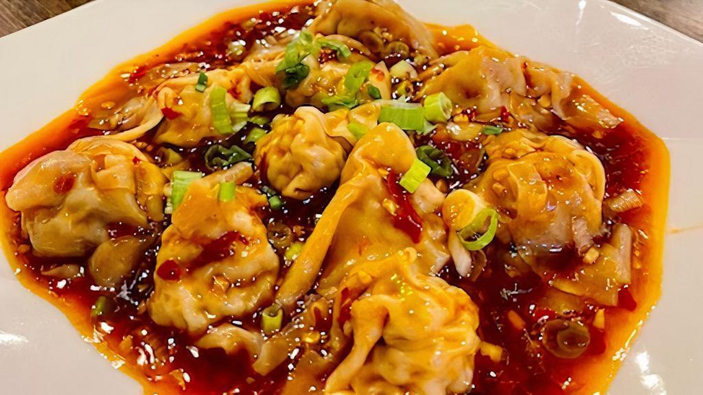 Steamed Wonton With Hot & Spicy Sauce · Hot & spicy.
