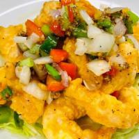 Salt & Pepper Shrimp · Hot & spicy. Sizzling hot wok tossed shrimp with garlic, onion, salt and pepper.