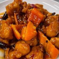 Orange Chicken · Hot & spicy.Lightly battered chicken, tossed with carrot, sugar peas, onion in orange zest s...