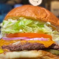 The Classic* · #LiveHappy - 1/4 lb beef patty*, cheddar, tomato, onion, pickle, lettuce, & sf sauce on Hawa...