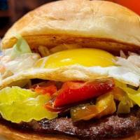 Cherry Popper* · #LiveHappy - 1/4 lb beef patty*, pepper marmalade, spicy slaw, pepper jack & fried egg* on a...