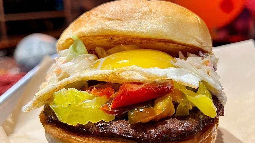 Cherry Popper* · #LiveHappy - 1/4 lb beef patty*, pepper marmalade, spicy slaw, pepper jack & fried egg* on a Hawaiian roll. **Allergens: wheat, soy, egg, cow's milk. *