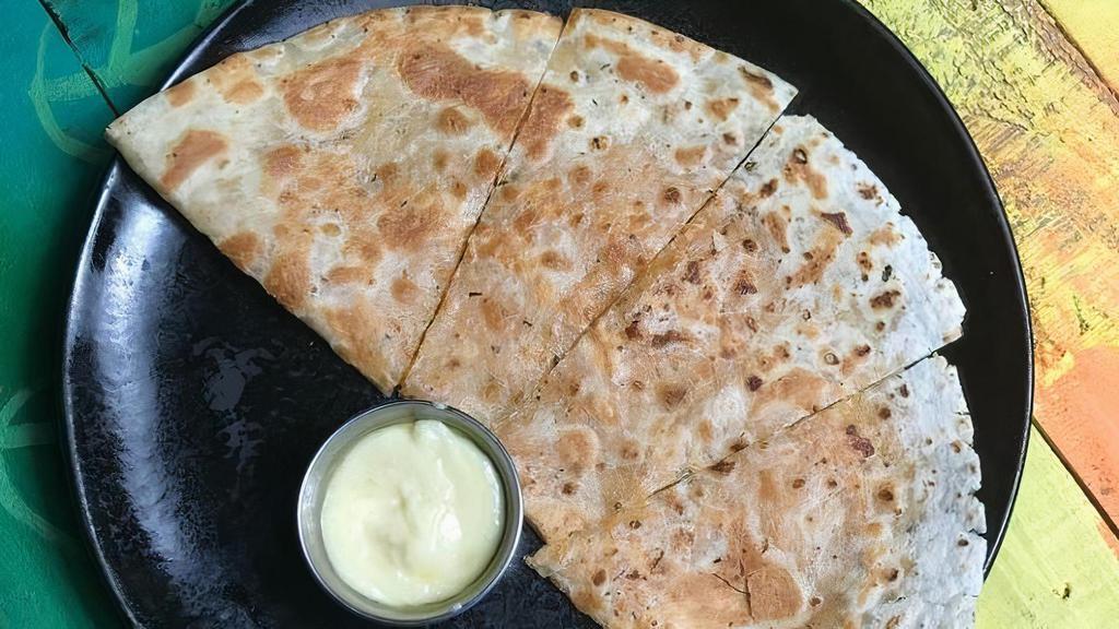 Kidsadilla · Cheese quesadilla w/cheese sauce for dipping. **Allergens: wheat, cow's milk