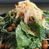House Salad · Mixed greens w/crispy chickpeas, vegan parmesan (almond), sliced apples, vegan caesar dressi...