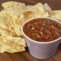 Chips & Red Salsa (Roja) · Fresh Made Chips and our red salsa (roja)