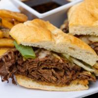 Prime Rib Philly Style Dip Au Jus · Our slow cooked prime rib served with sauteed onions, bell peppers, melted pepper jack chees...