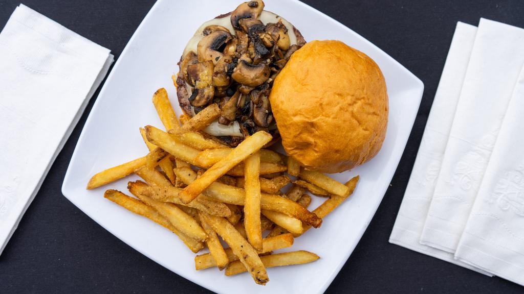 Mushroom Cheese Burger · Swiss cheese and fresh sauteed mushrooms highlight this American classic.