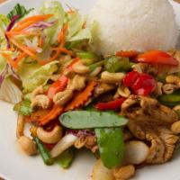 Cashew Nut Chicken · Chicken, bell peppers, onions, cashew nuts, mushrooms, snow peas, baby corn and celery stir-...