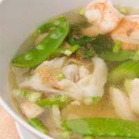Supreme Wonton Soup · Shrimp and pork stuffed wontons with celery, onions, chicken, and shrimp in a flavored broth.