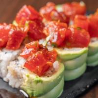 Mr Miyagi · yellowtail,  crab salad rolled in avocado, topped poki tuna, sweet soy