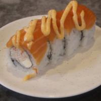 New York Roll · Raw. Crab salad, cream cheese inside, salmon, special sauce on top.