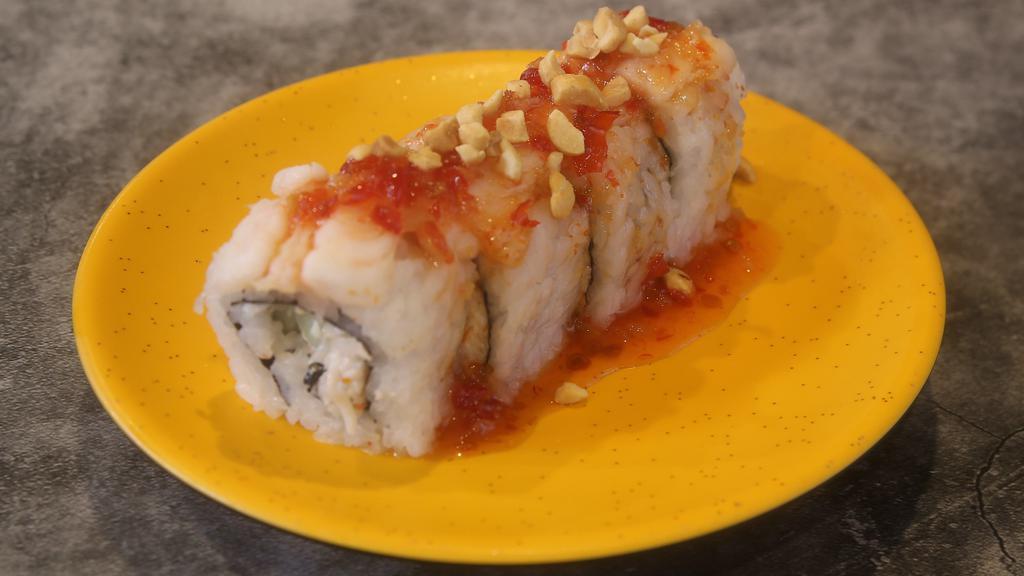 Ichi Roll · Cucumber, crab salad inside, shrimp, ground peanut on top, and sweet chili sauce.