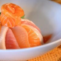 Chirashi · Assorted sashimi served over rice. * 
 
*Contains Raw Fish