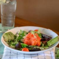 Poke Bowl · Fresh tuna and salmon mixed in our house poke dressing, served over rice, avocado, cucumbers...