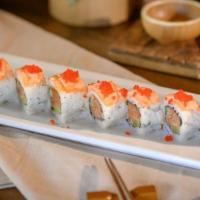 Hudson Roll · Spicy tuna, cucumber, oshiko, topped with tobiko, salmon seared with our rainer and unagi sa...