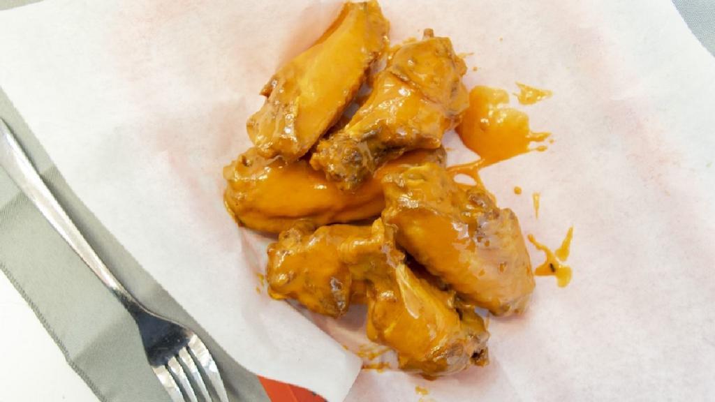 Bone-In Wings (6Pc) · One flavor. Fresh never frozen chicken wings. Freshly fried to perfection. No RANCH included