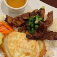 Beef Short Ribs & Fried Egg · Served with cucumber, tomato, lettuce, daikon, carrots, steamed rice or broken rice, a side ...