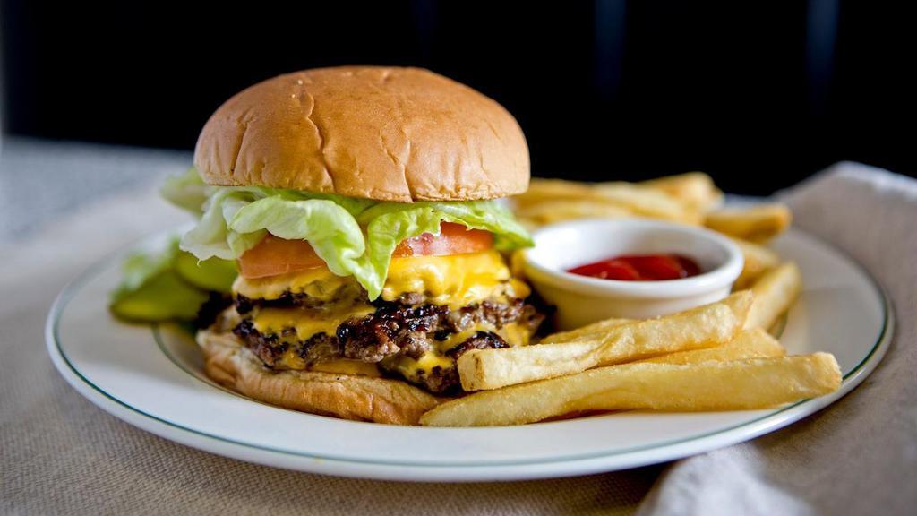 Triple Cheeseburger · Happy’s signature burger w/ caramelized onions and american or cheddar cheese.