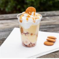 Brandon’S Nana Pudd’N · Nilla wafers and  fresh bananas  dredged in Ghirardelli’s caramel sauce and topped with home...