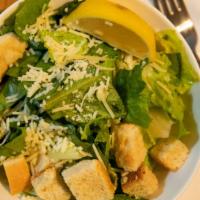 Grilled Chicken Caesar Salad · Another classic! Five oz. grilled breast of chicken, parmesan cheese and Caesar dressing, ha...